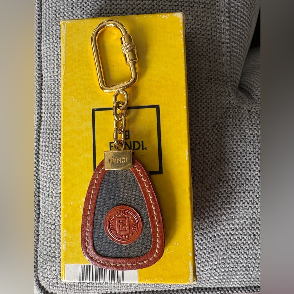 Fendi Pequin Gold and Brown Leather Keychain with box.